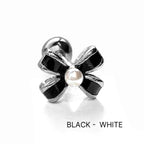 A3 080 [サージカルステンレス]　上品リボンピアス