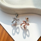 A5 244 [サージカルステンレス]　チャームリボンピアス