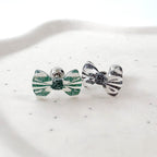 MK 083 ［サージカルステンレス］クリアパールリボンピアス