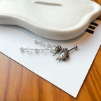 A2 216 ［サージカルステンレス］ビッグリボンドロップピアス