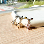 MP 072 ［サージカルステンレス］キュービッククロス星ピアス