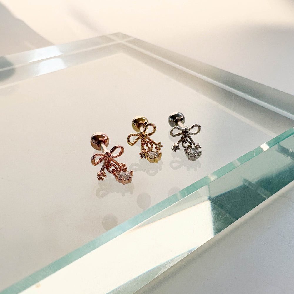 A8 283 ［サージカルステンレス］ねじりリボンピアス