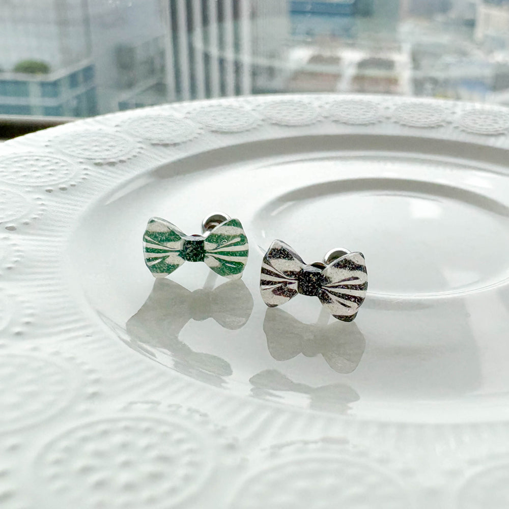 MK 083 ［サージカルステンレス］クリアパールリボンピアス