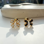 A3 080 [サージカルステンレス]　上品リボンピアス