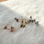 A3 080 [サージカルステンレス]　上品リボンピアス