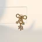 A8 283 ［サージカルステンレス］ねじりリボンピアス