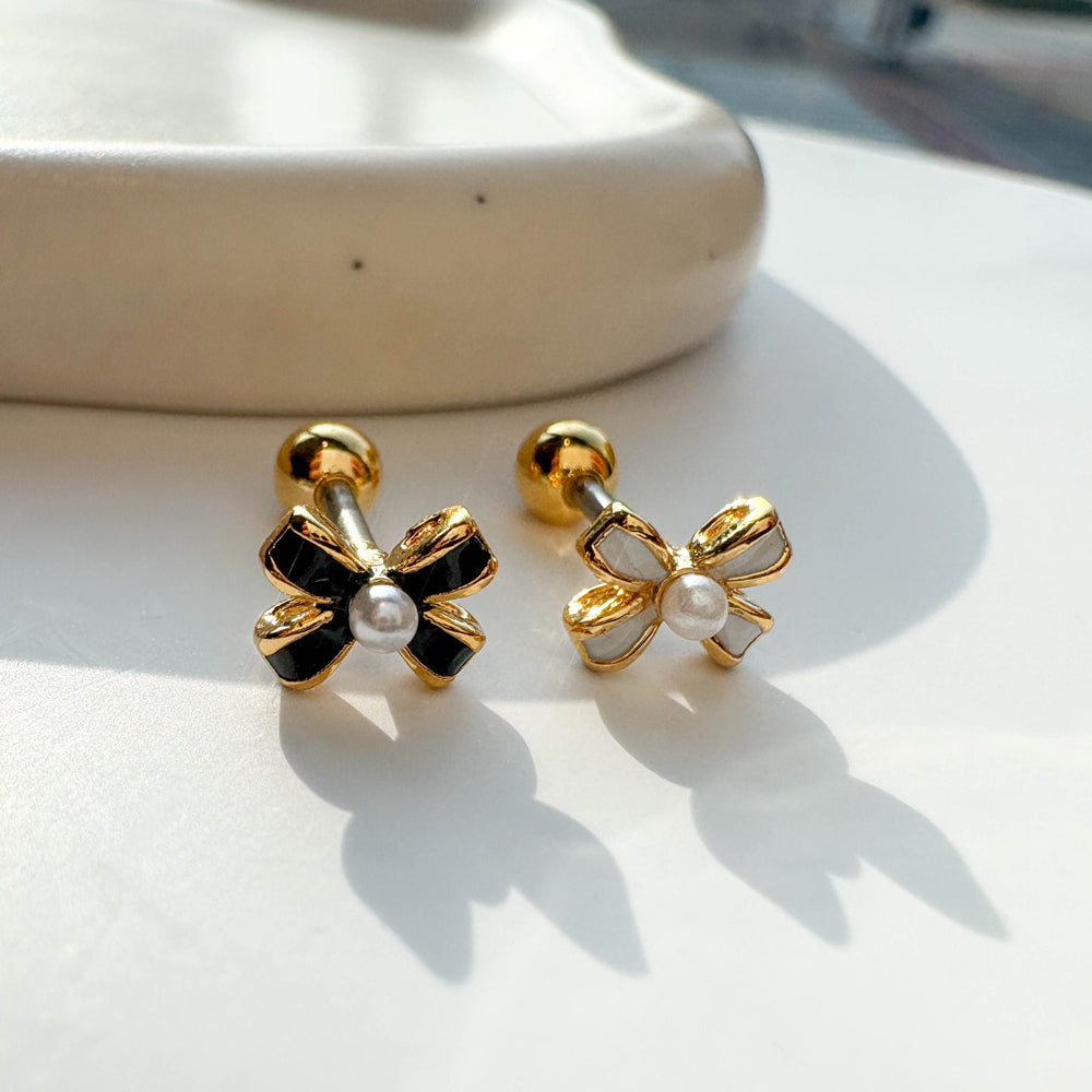 A3 080 [サージカルステンレス]　上品リボンピアス