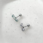 MK 083 ［サージカルステンレス］クリアパールリボンピアス