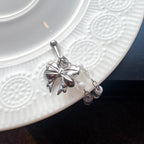 A2 216 ［サージカルステンレス］ビッグリボンドロップピアス